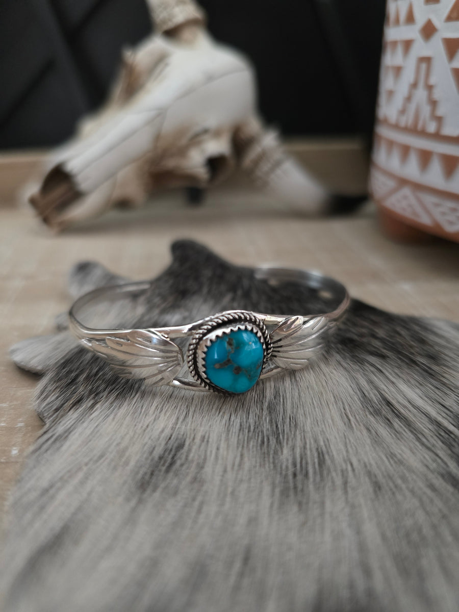 JEANETTE YAZZIE FEATHER AND TURQUOISE STONE CUFF – Kittie K Ranch
