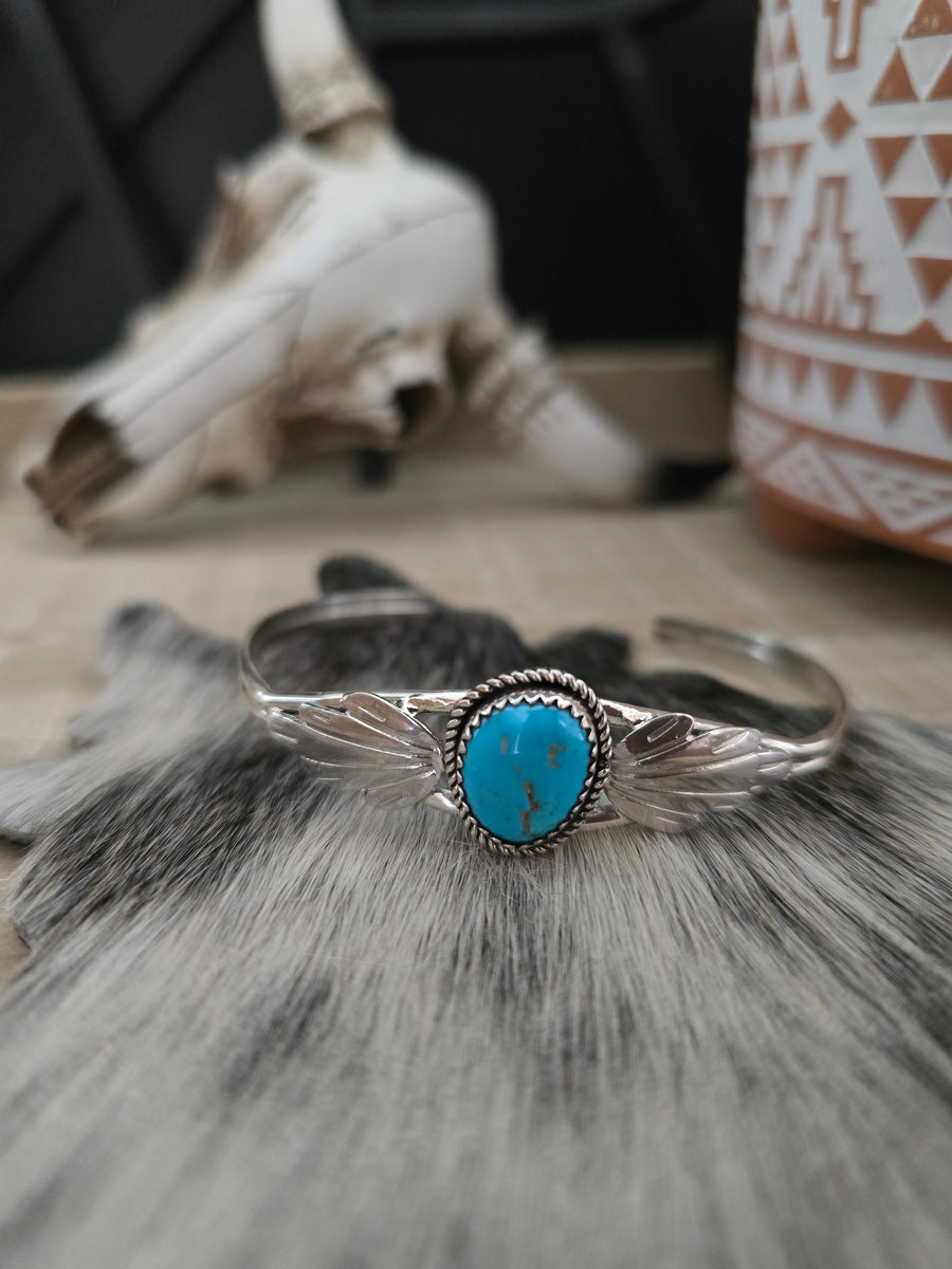 JEANETTE YAZZIE FEATHER AND TURQUOISE STONE CUFF – Kittie K Ranch