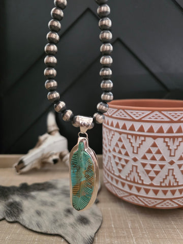 CARVED TURQUOISE FEATHER PENDANT