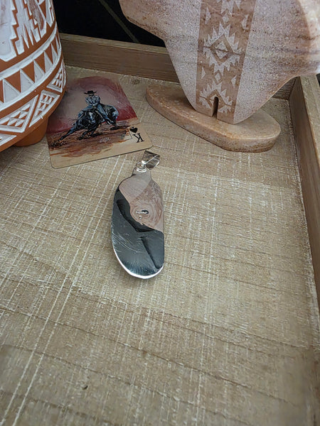 CARVED TURQUOISE FEATHER PENDANT