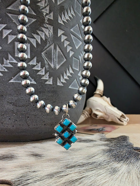 PAULINE NELSON KINGMAN SEVEN STONE TURQUOISE PENDANT