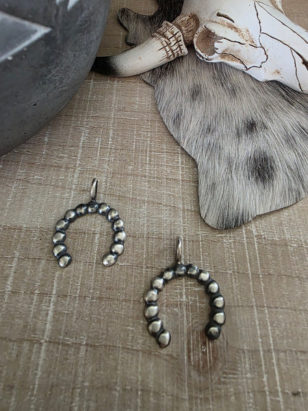 PAULINE NELSON STERLING SILVER NAJA PENDANT