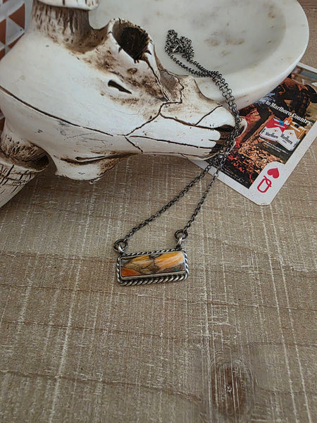 AUGUSTINE LARGO LITTLE SPINY OYSTER AND BRONZE BAR NECKLACE