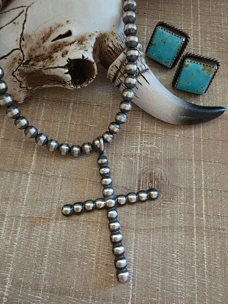 PAULINE NELSON SILVER CROSS PENDANT