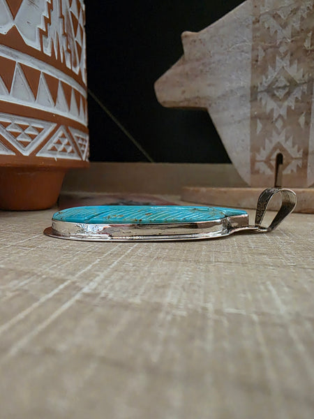 CARVED TURQUOISE FEATHER PENDANT