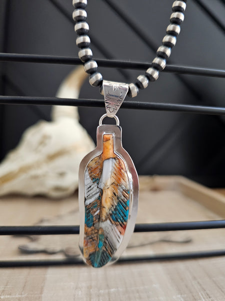ARONZO CHARLEY CARVED TURQUOISE FEATHER PENDANT