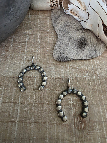 PAULINE NELSON STERLING SILVER NAJA PENDANT