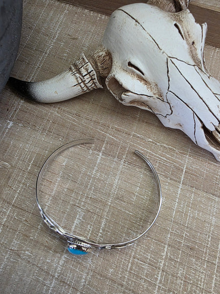 JEANETTE YAZZIE FEATHER AND TURQUOISE STONE CUFF