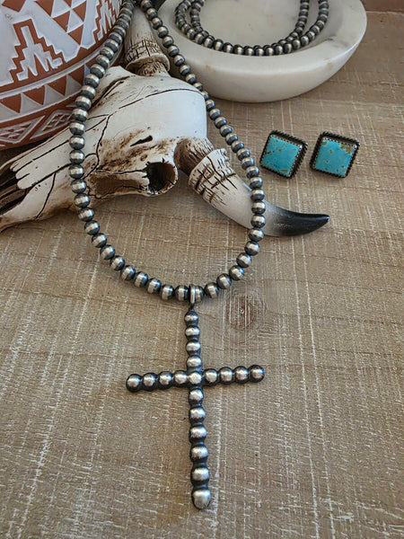 PAULINE NELSON SILVER CROSS PENDANT