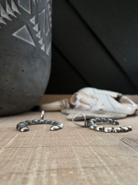 PAULINE NELSON STERLING SILVER NAJA PENDANT