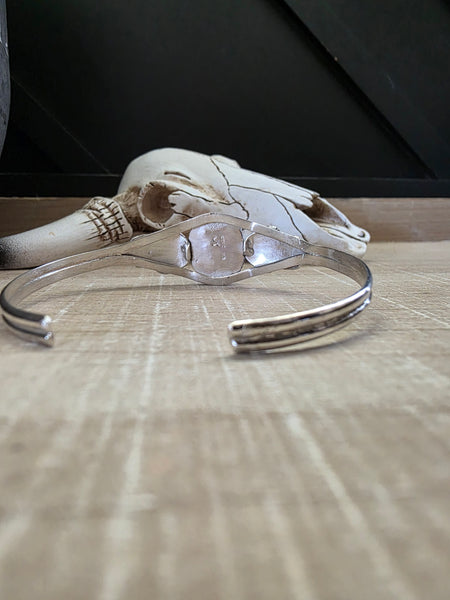 JEANETTE YAZZIE FEATHER AND TURQUOISE STONE CUFF