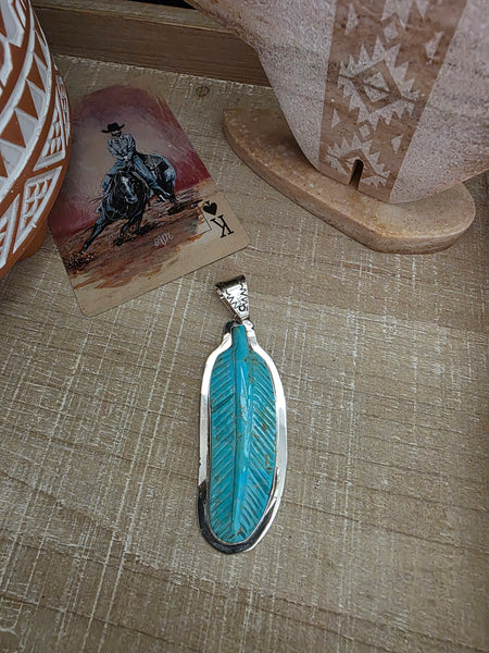 CARVED TURQUOISE FEATHER PENDANT